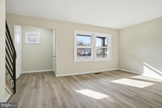 an empty room with windows