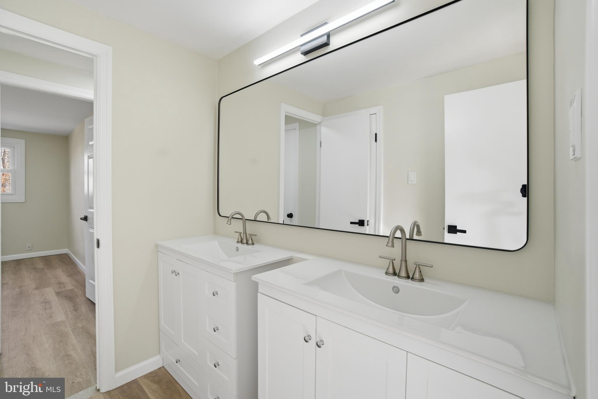 7 Riverview Place Willingboro, NJ 08046 - Photo 18 of 25 a bathroom with a sink and a mirror