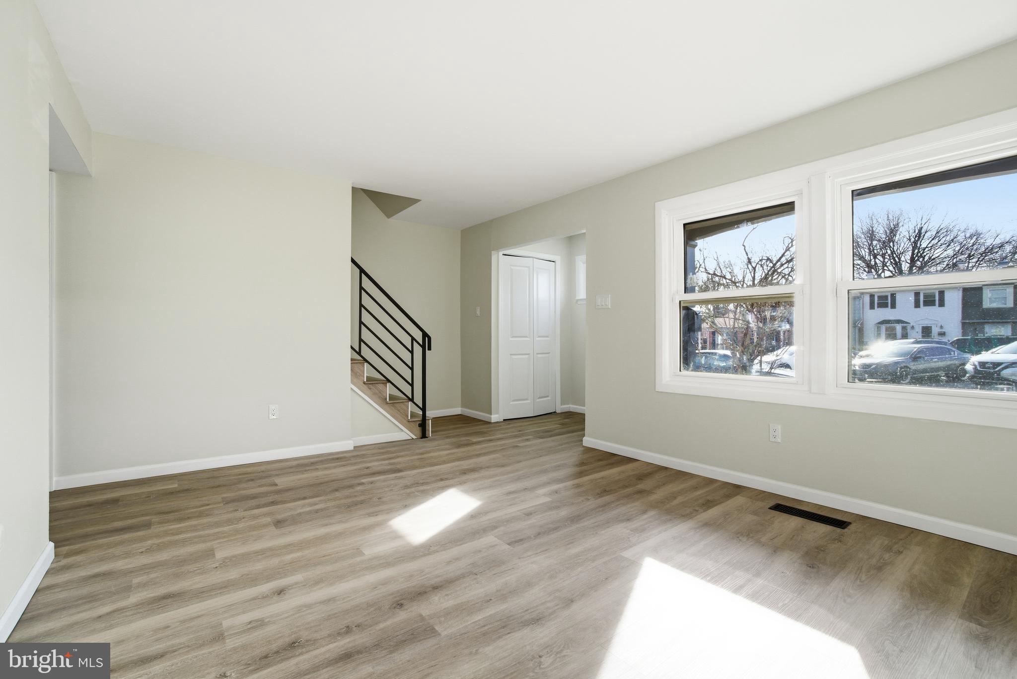7 Riverview Place Willingboro, NJ 08046 - Photo 3 of 25 a view of an empty room with wooden floor and a window