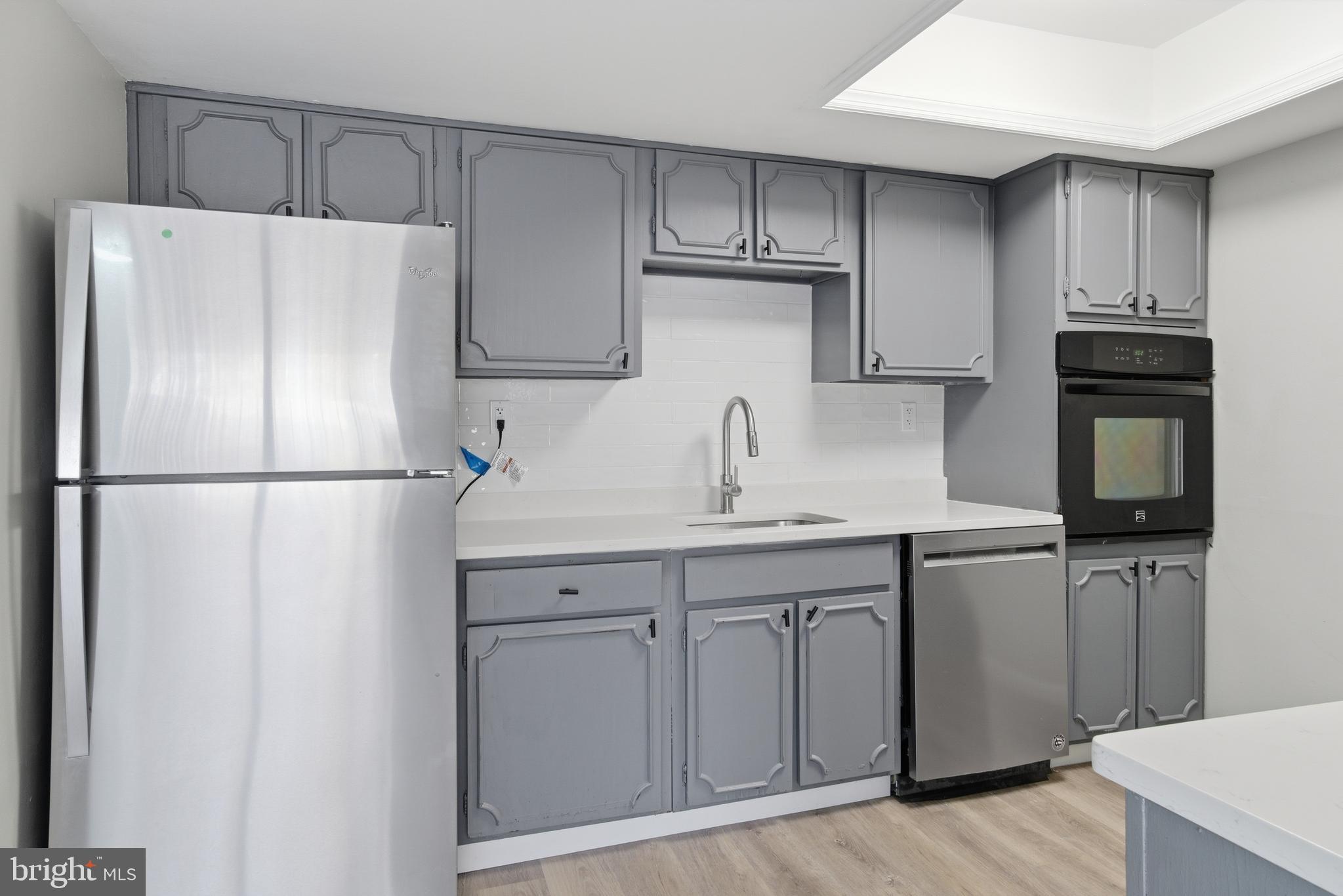 7 Riverview Place Willingboro, NJ 08046 - Photo 8 of 25 a kitchen with appliances a sink and cabinets
