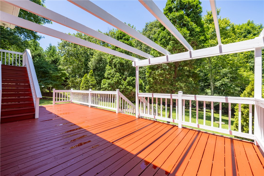 429 Burns Mill Road West Union, SC 29696 - Photo 34 of 49 A spacious wooden deck provides an elevated outdoor retreat with verdant views.