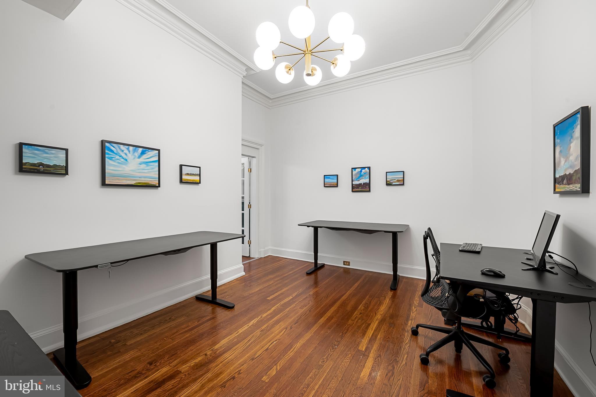16 West Read Street Baltimore, MD 21201 - Photo 12 of 59 a view of a workspace with furniture and a window