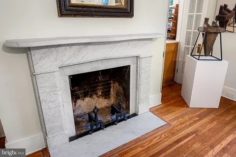 a living room with a fireplace