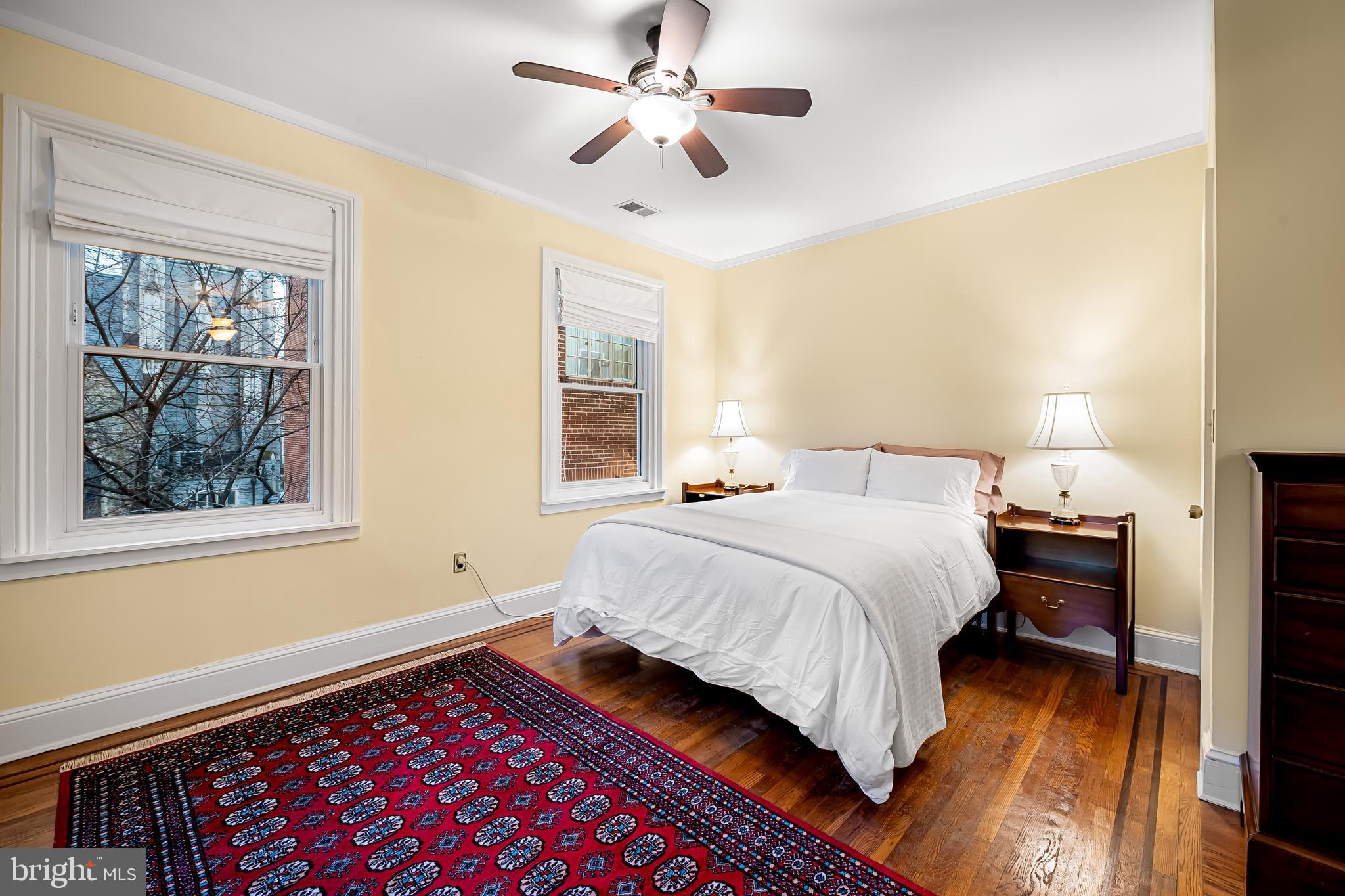 16 West Read Street Baltimore, MD 21201 - Photo 31 of 59 a bedroom with a bed and a window