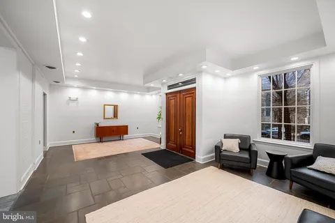 a view of a livingroom with furniture and windows