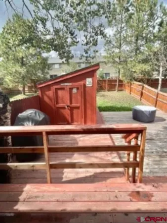 a view of backyard with deck