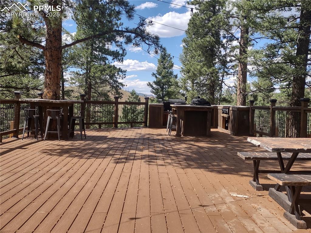 1176 Trail Creek Road Lake George, CO 80827 - Photo 12 of 48 a view of a backyard with sitting area