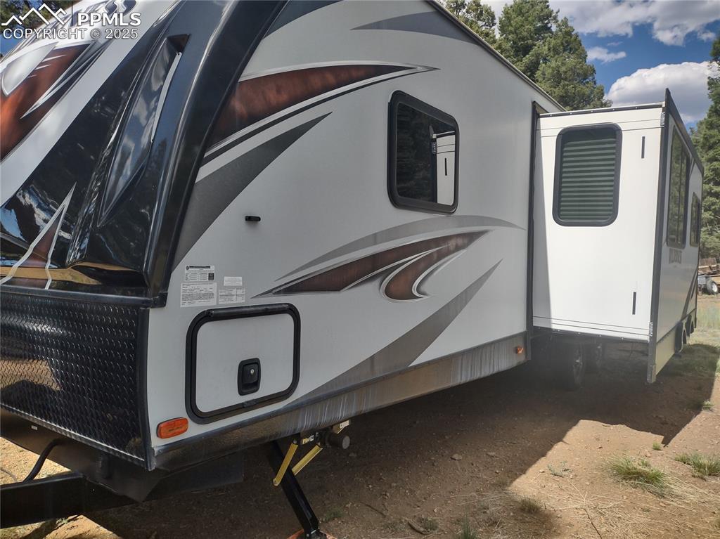 1176 Trail Creek Road Lake George, CO 80827 - Photo 35 of 48 a close up of a storage and utility room with a washer dryer