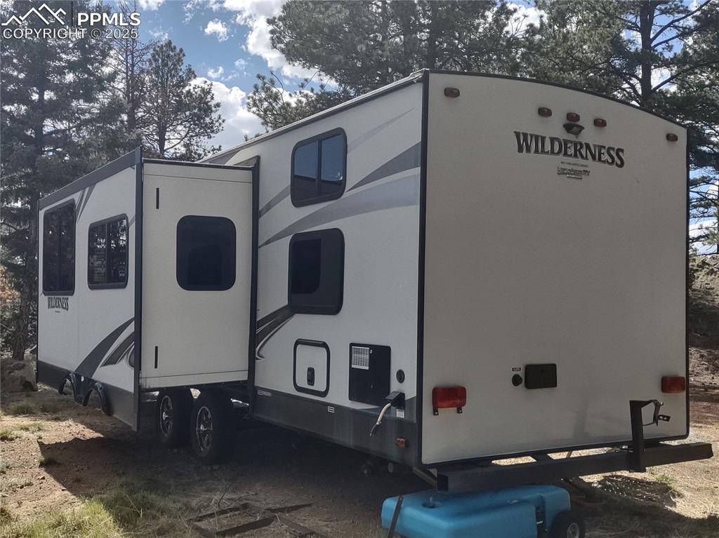 1176 Trail Creek Road Lake George, CO 80827 - Photo 37 of 48 a front view of a house with entryway