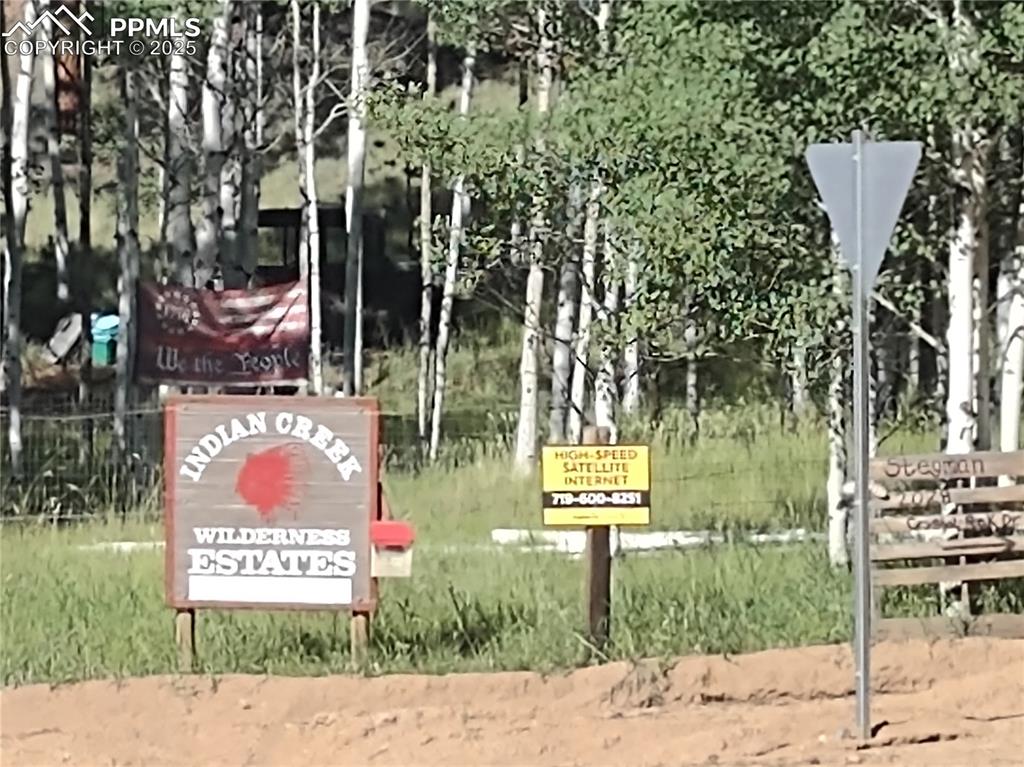 1176 Trail Creek Road Lake George, CO 80827 - Photo 41 of 48 a sign that is on the side of a road