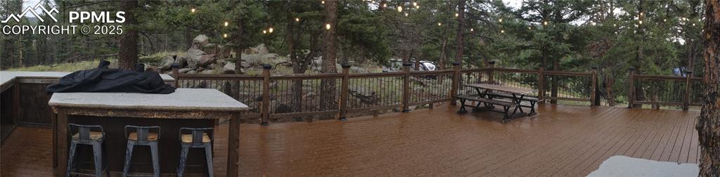 1176 Trail Creek Road Lake George, CO 80827 - Photo 43 of 48 a view of a dinning table and chairs in patio