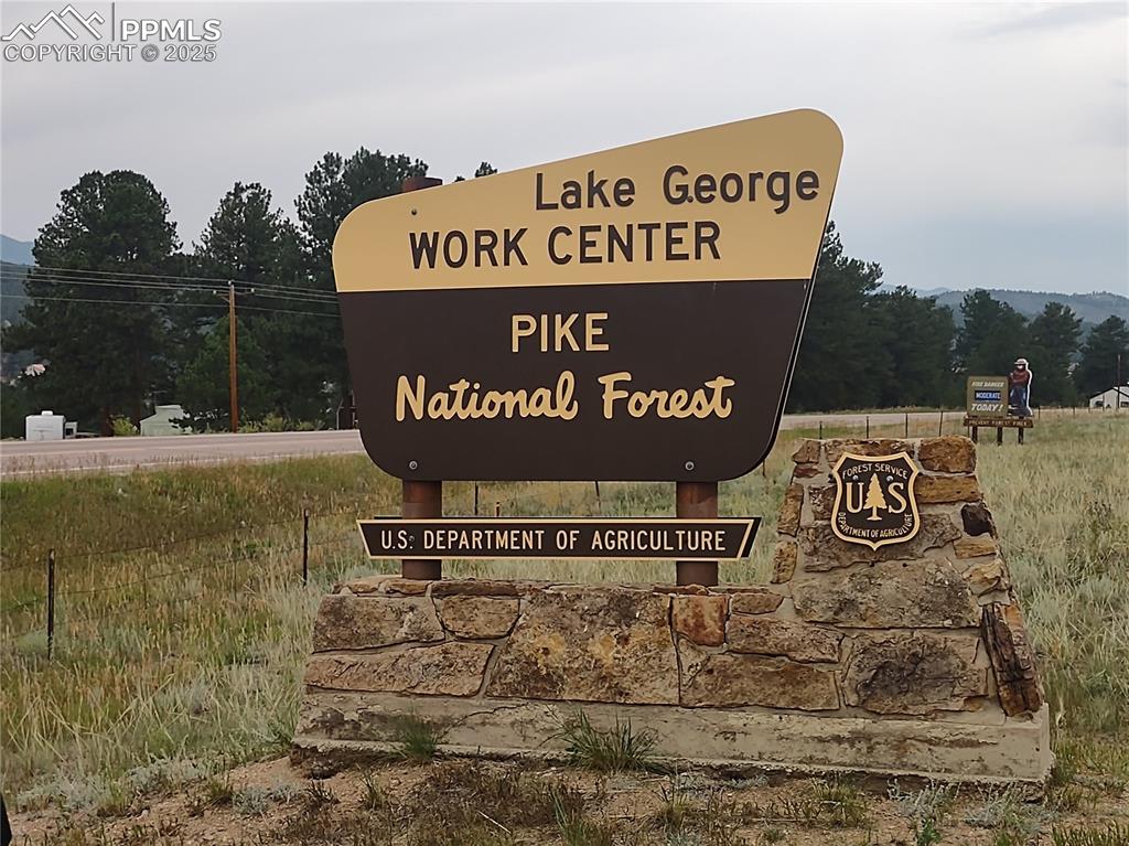 1176 Trail Creek Road Lake George, CO 80827 - Photo 48 of 48 a sign broad on the side of the road