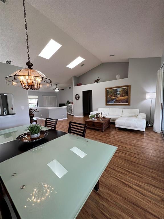 18266 Covina Way, Unit 202 Boca Raton, FL 33498 - Photo 11 of 52 a living room with furniture and flat screen tv