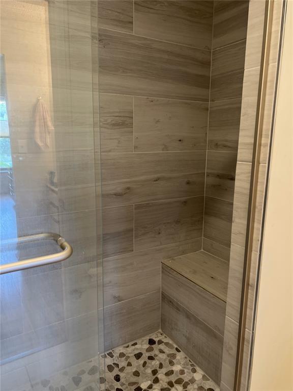18266 Covina Way, Unit 202 Boca Raton, FL 33498 - Photo 33 of 52 a bathroom with a shower
