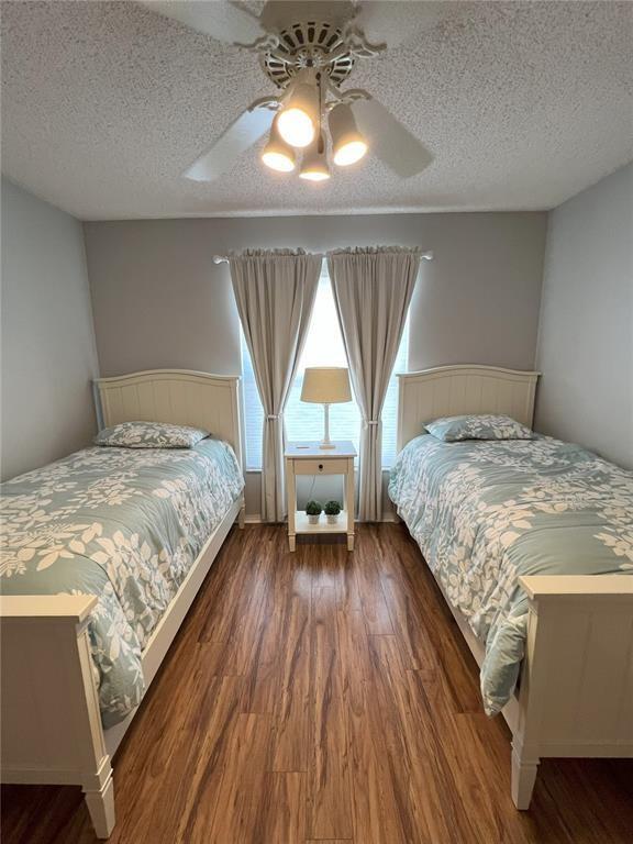 18266 Covina Way, Unit 202 Boca Raton, FL 33498 - Photo 36 of 52 a bedroom with a bed and a window