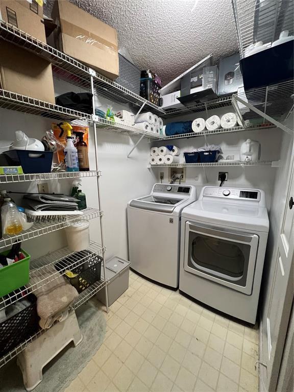 18266 Covina Way, Unit 202 Boca Raton, FL 33498 - Photo 42 of 52 a kitchen with a stove and a microwave