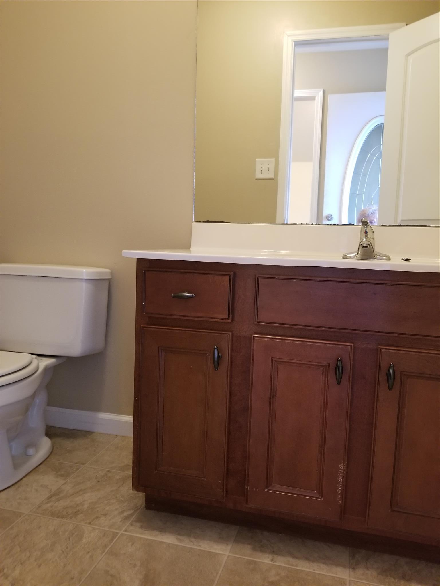 1537 Apache Way Clarksville, TN 37042 - Photo 11 of 19 a bathroom with a sink and a toilet
