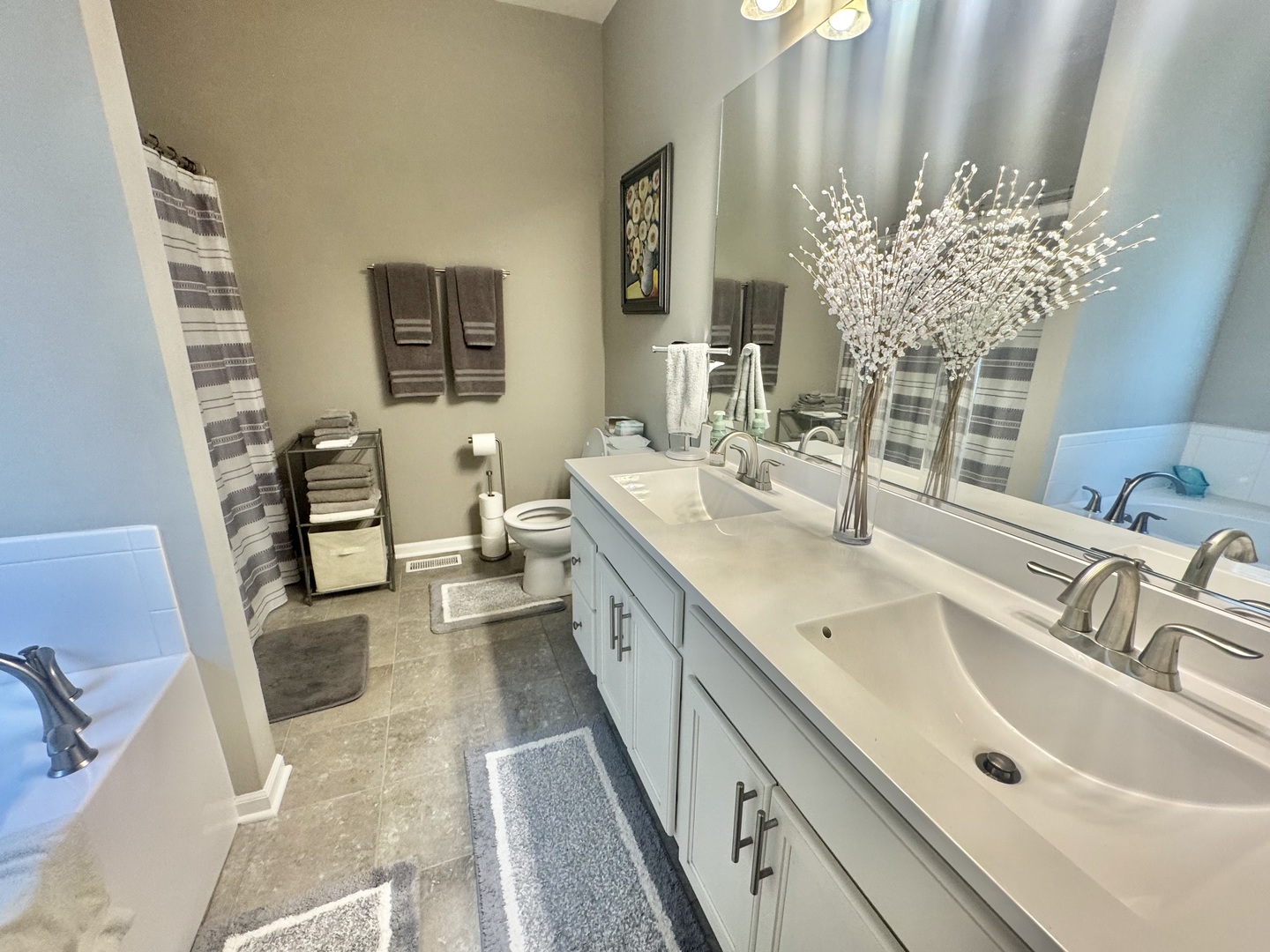 554 Stonebrook Drive Romeoville, IL 60446 - Photo 13 of 28 a spacious bathroom with double vanity and a mirror