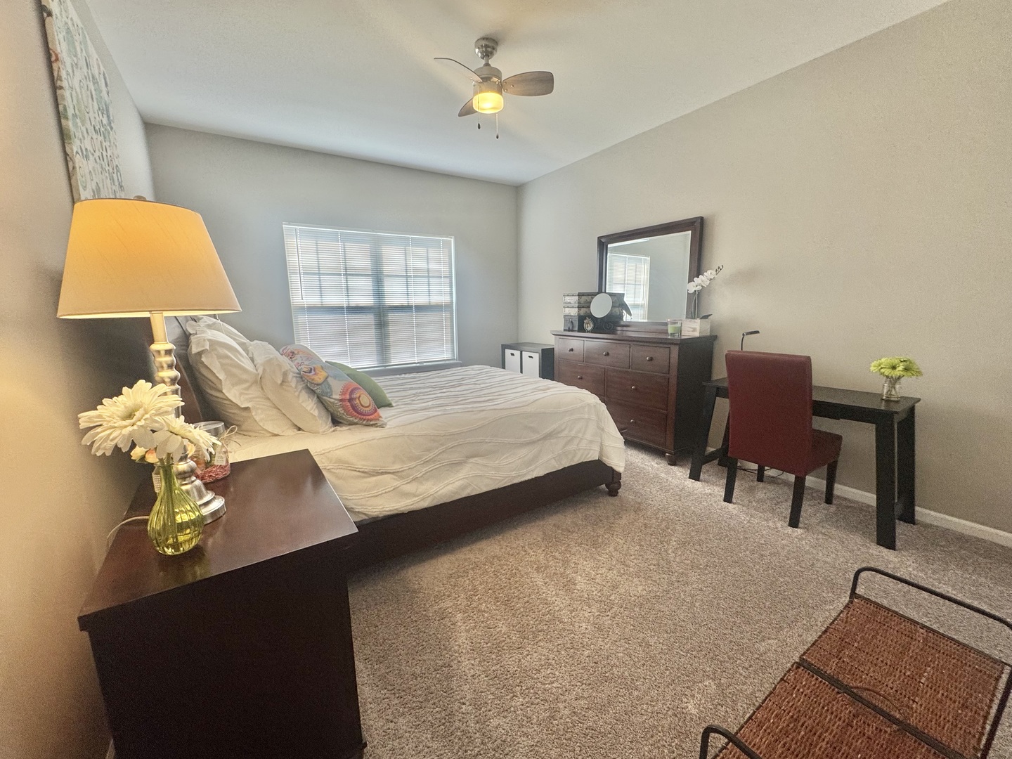 554 Stonebrook Drive Romeoville, IL 60446 - Photo 14 of 28 a bedroom with a bed dresser and a window