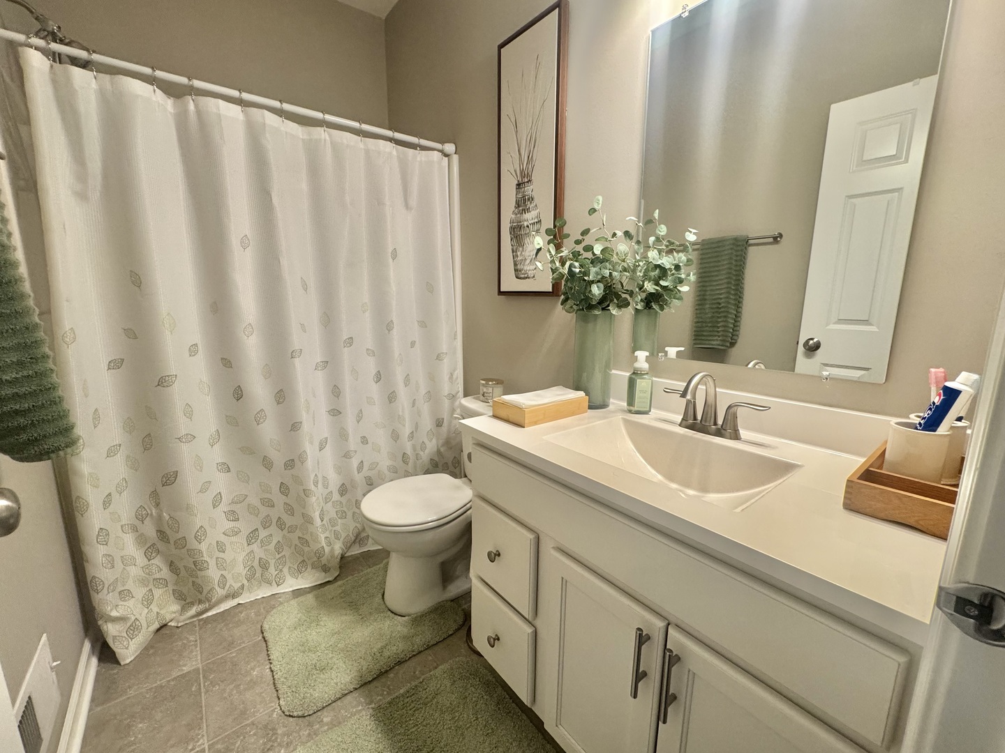 554 Stonebrook Drive Romeoville, IL 60446 - Photo 16 of 28 a bathroom with a granite countertop sink and a mirror