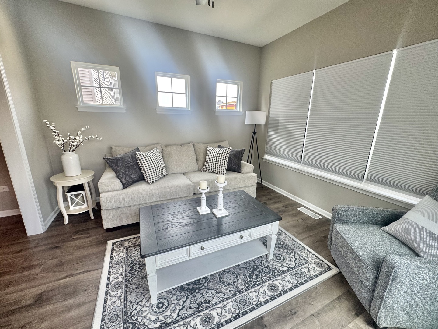 554 Stonebrook Drive Romeoville, IL 60446 - Photo 21 of 28 a living room with a couch and a rug