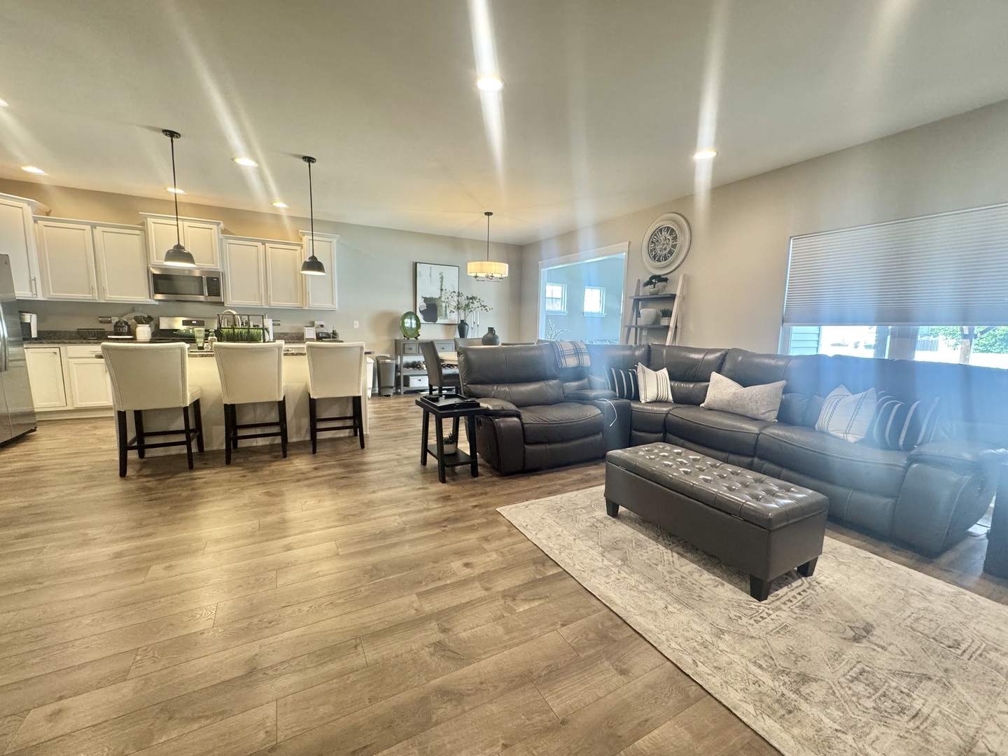 554 Stonebrook Drive Romeoville, IL 60446 - Photo 4 of 28 a living room with furniture and a wooden floor