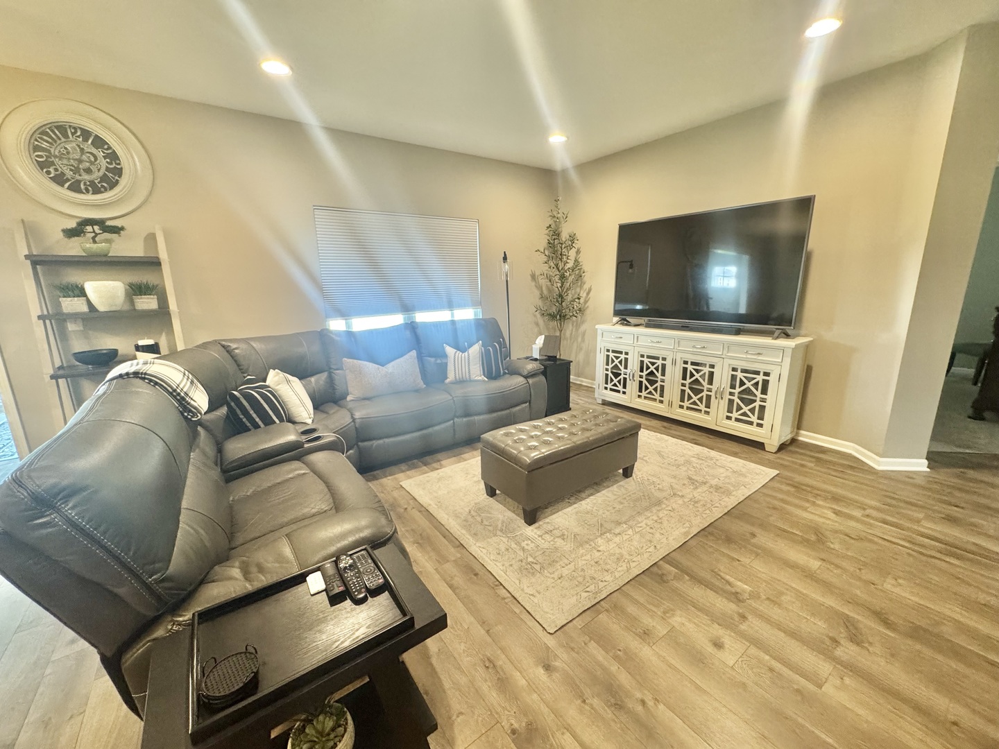 554 Stonebrook Drive Romeoville, IL 60446 - Photo 5 of 28 a living room with furniture and a flat screen tv