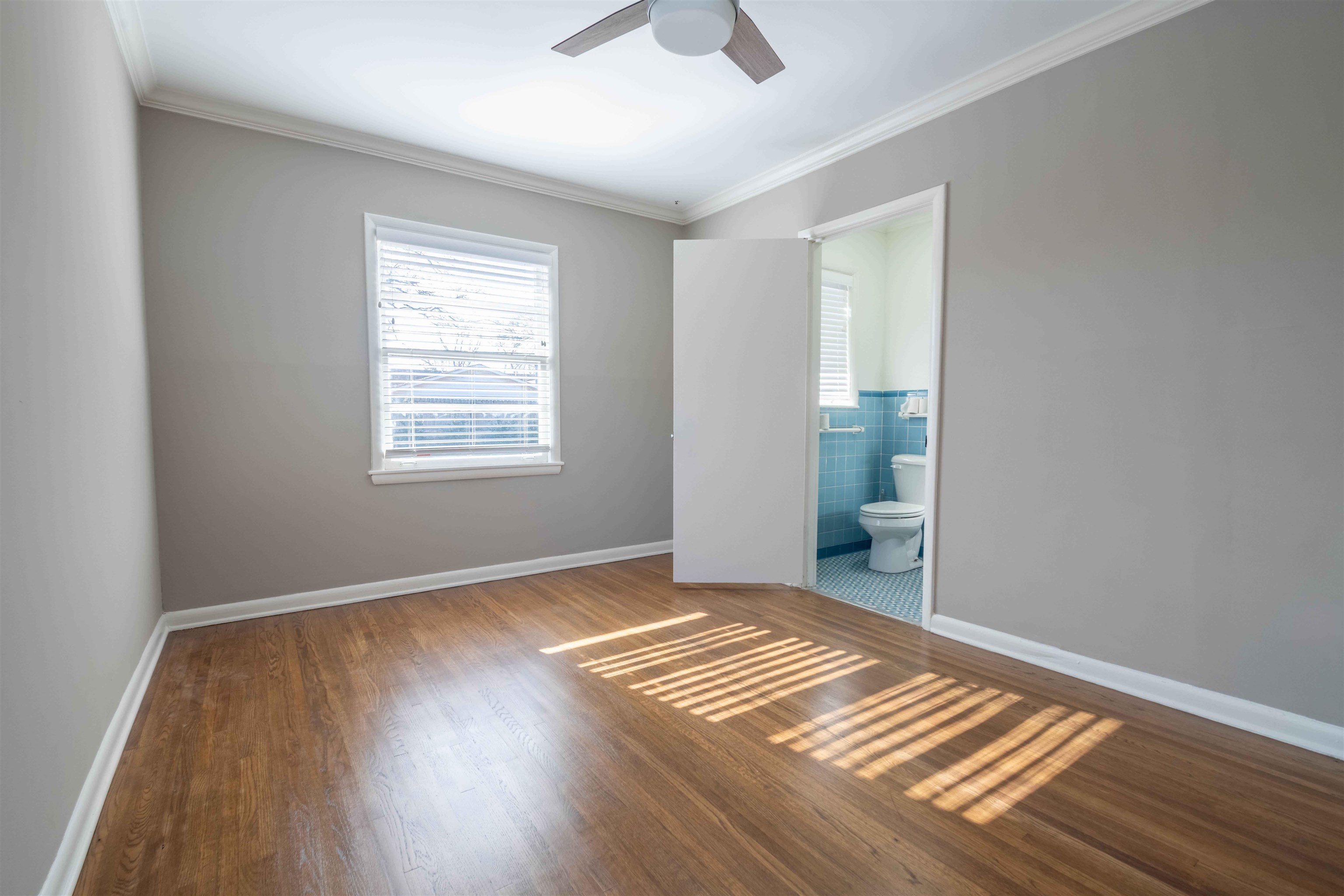 4915 Amboy Road Memphis, TN 38117 - Photo 13 of 17 a view of wooden floor in an empty room with a window