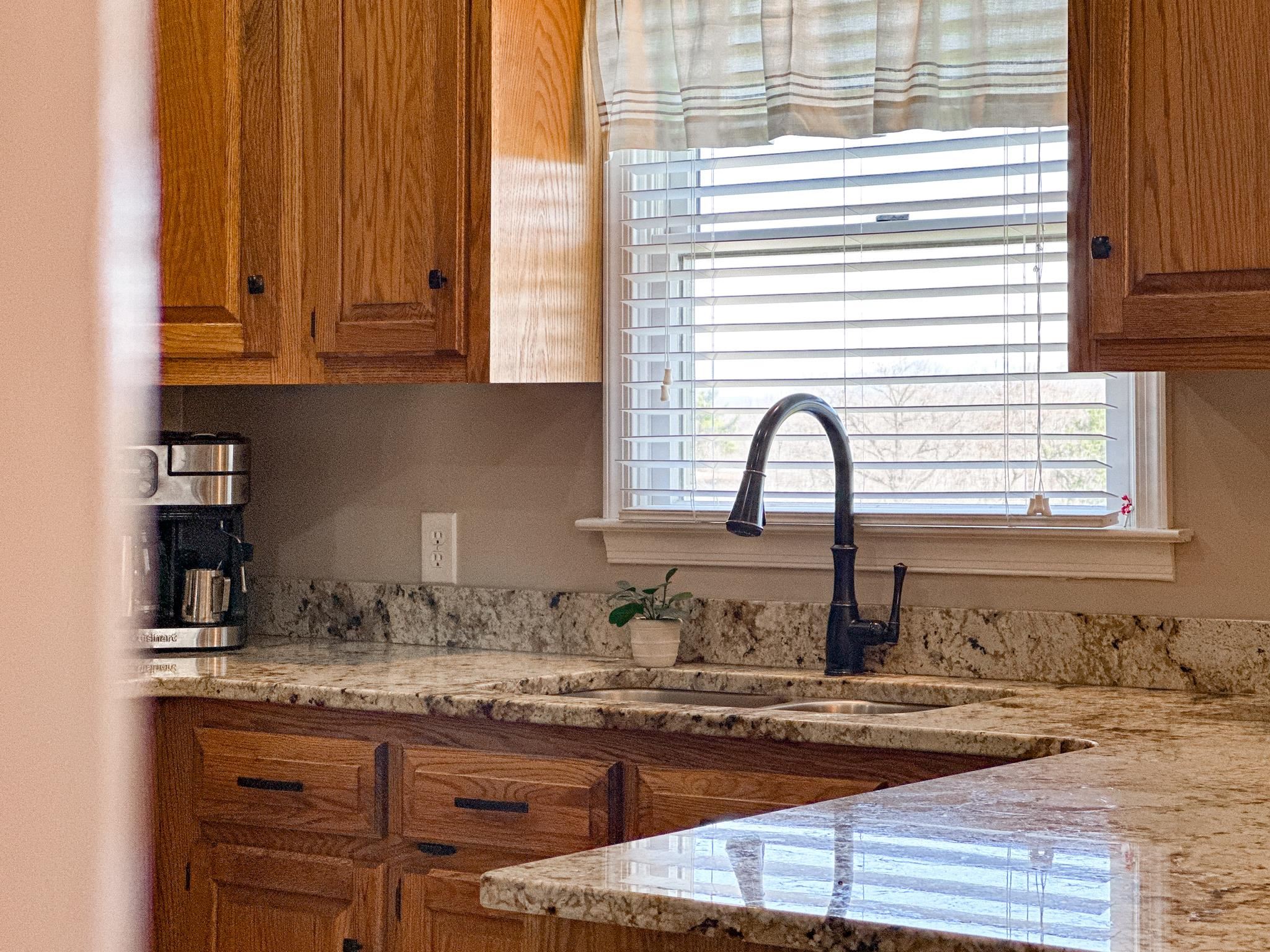 164 Spring Meadows Staunton, VA 24401 - Photo 19 of 37 a kitchen with granite countertop a sink and a window