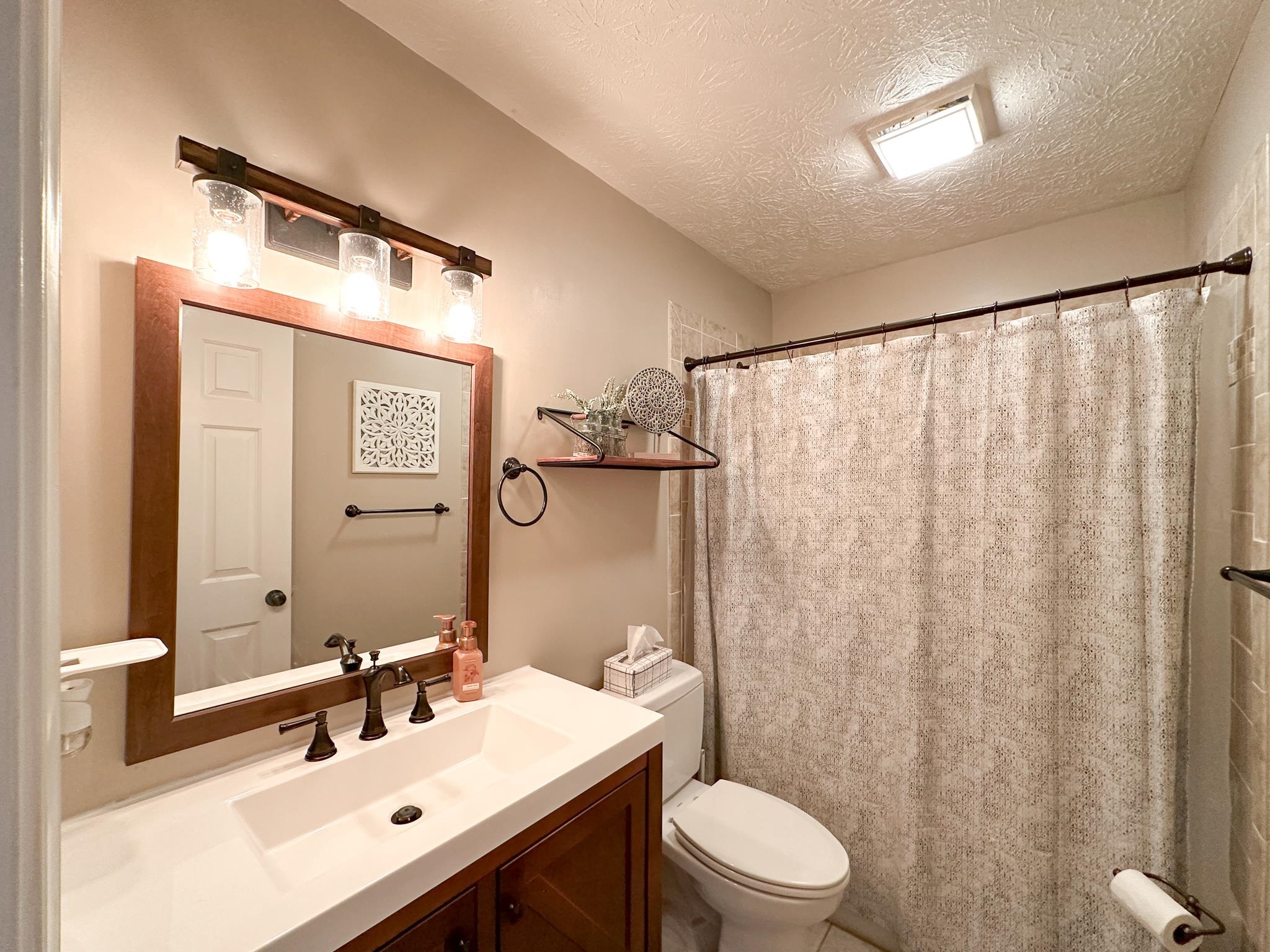 164 Spring Meadows Staunton, VA 24401 - Photo 29 of 37 a bathroom with a sink a toilet and shower