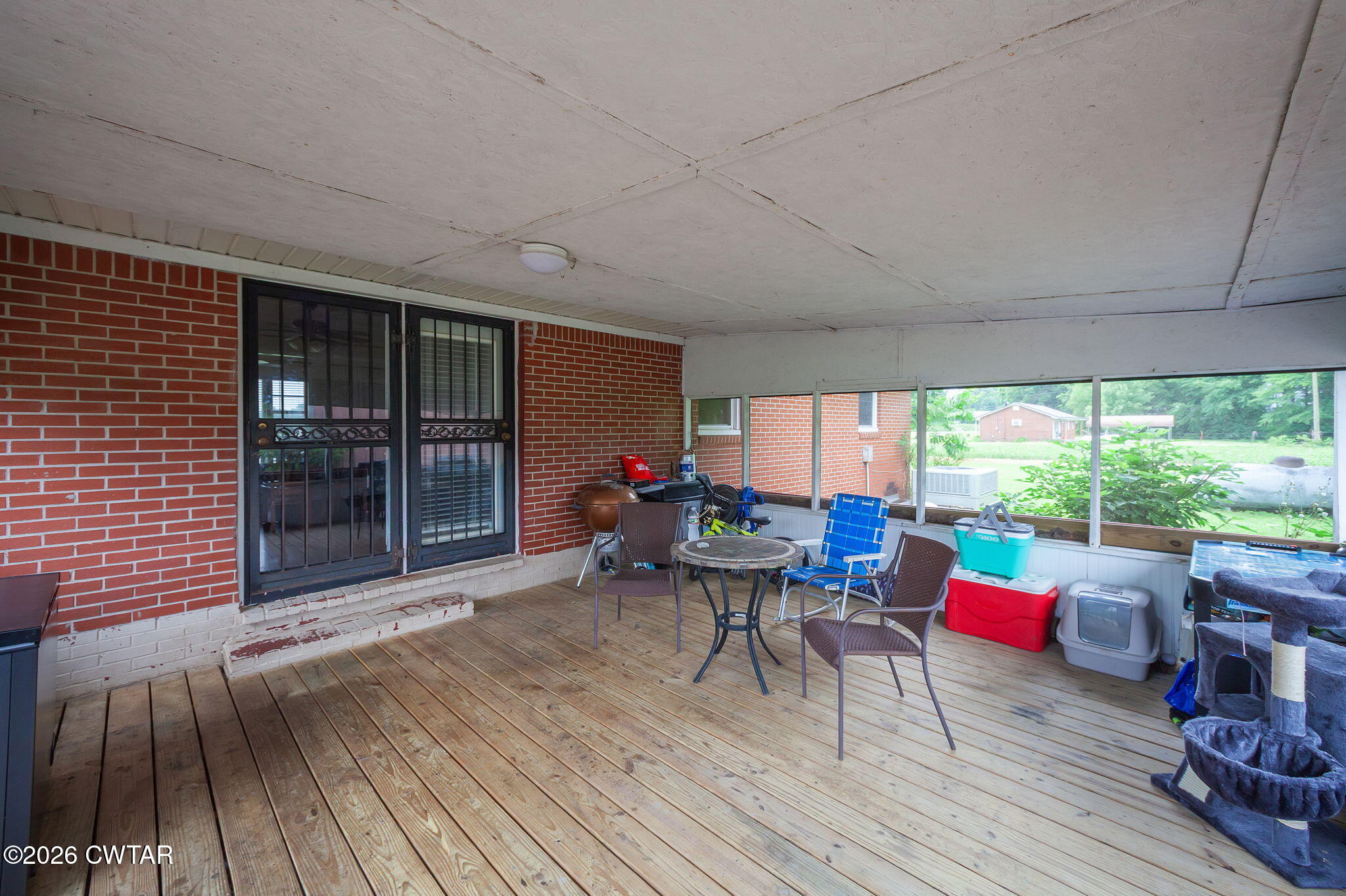 1921 Nance Road Alamo, TN 38001 - Photo 7 of 29 a living room filled with furniture and a wooden floor