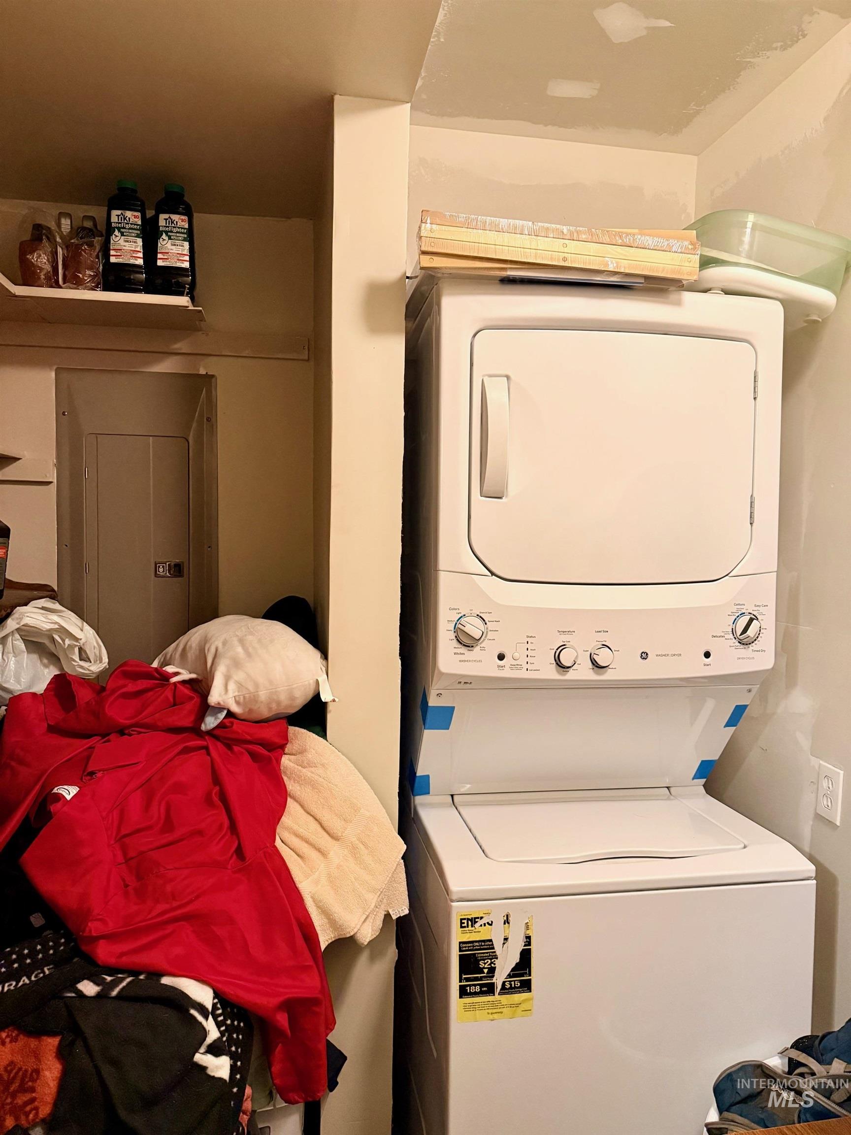 335 Pine Street Peck, ID 83545 - Photo 17 of 36 Laundry area featuring stacked washer / dryer and electric panel