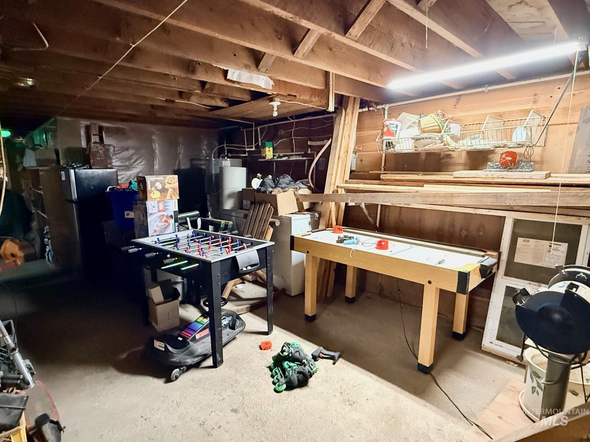 335 Pine Street Peck, ID 83545 - Photo 25 of 36 Unfinished basement with freestanding refrigerator