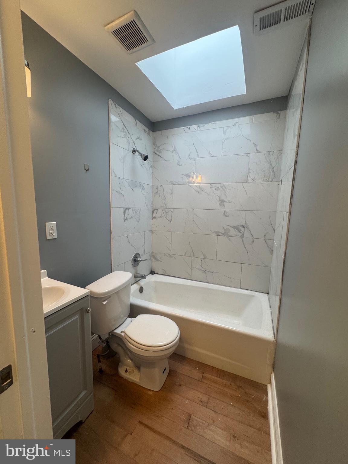 3221 Lyndale Avenue Baltimore, MD 21213 - Photo 5 of 21 a bathroom with a sink and bathtub