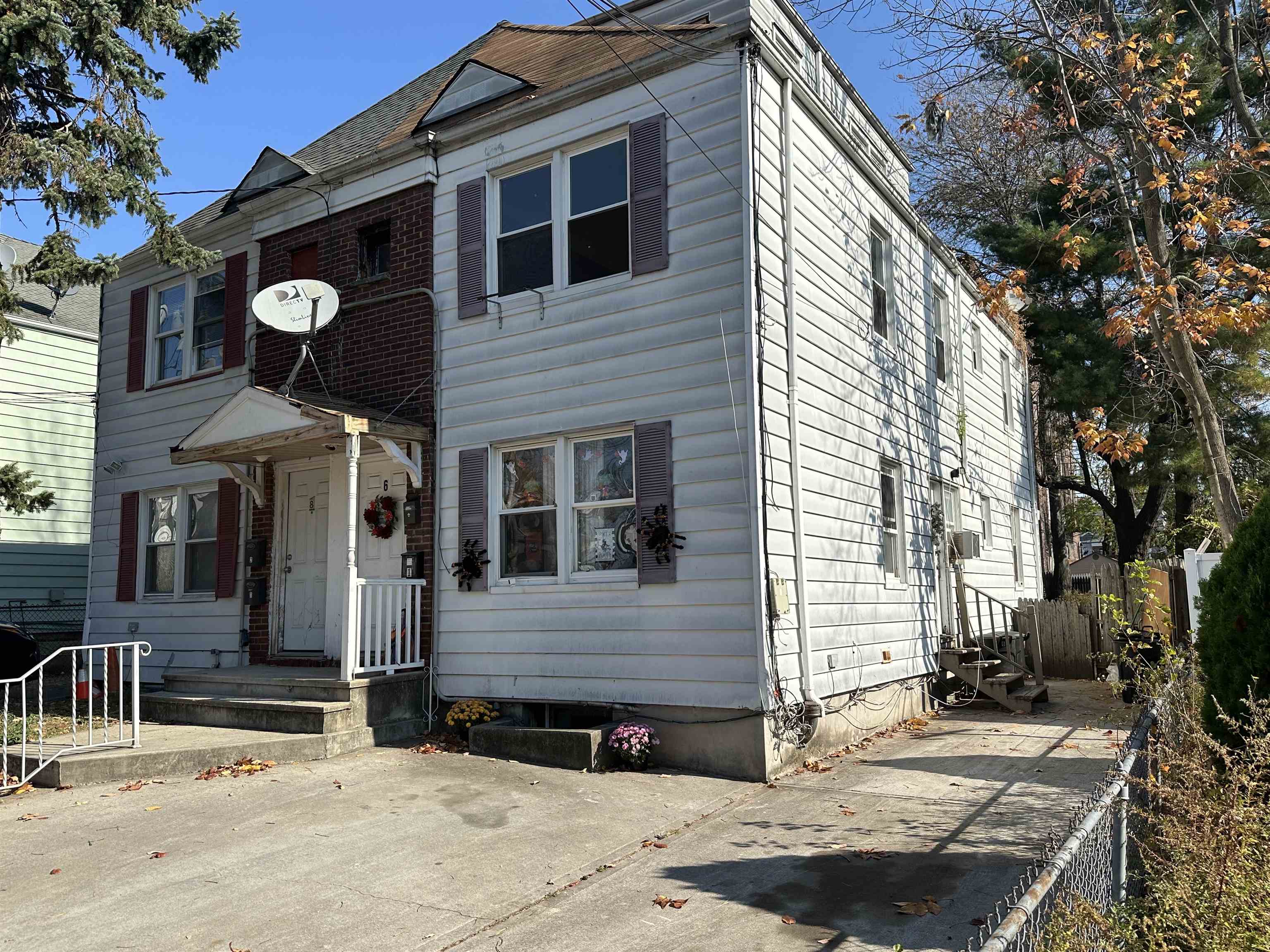 6 Kelly Parkway, Unit 2 Bayonne, NJ 07002 - Photo 6 of 9 a view of a house with a yard