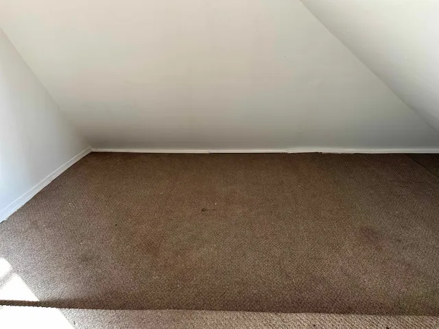 a view of room and yard