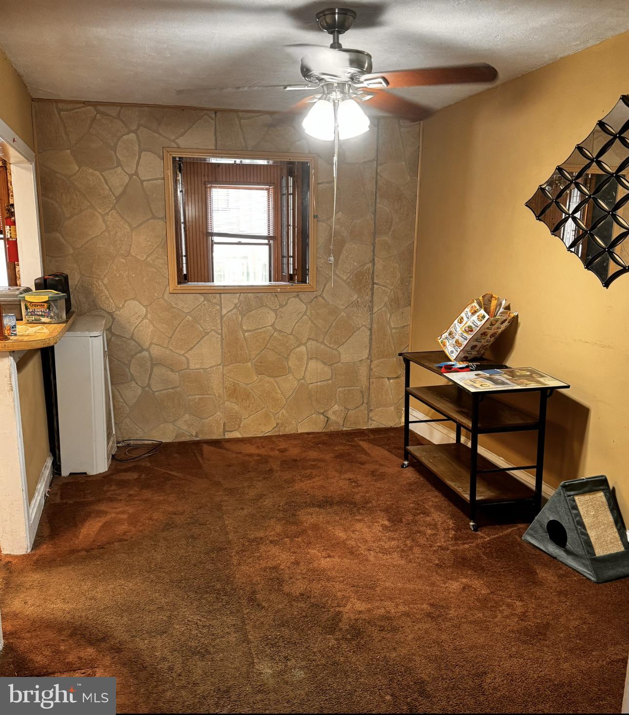 7033 Radbourne Road Upper Darby, PA 19082 - Photo 3 of 9 a living room with furniture and a window