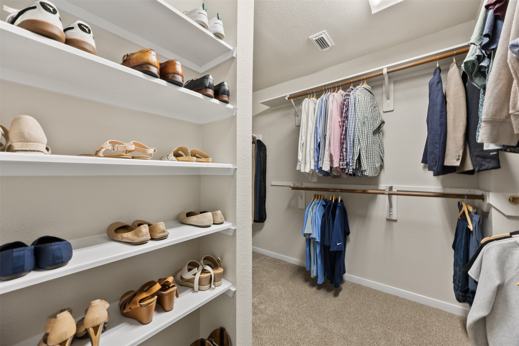 2219 Louetta Brook Lane Spring, TX 77388 - Photo 29 of 34 Large walk-in closet with built-in shelving and generous hanging space.
