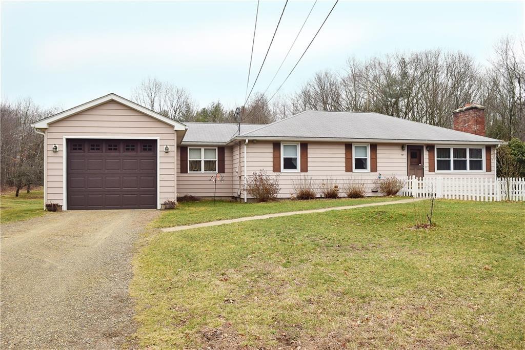 97 Leonard Road Stafford, CT 06076 - Photo 1 of 1 a front view of a house with a garden
