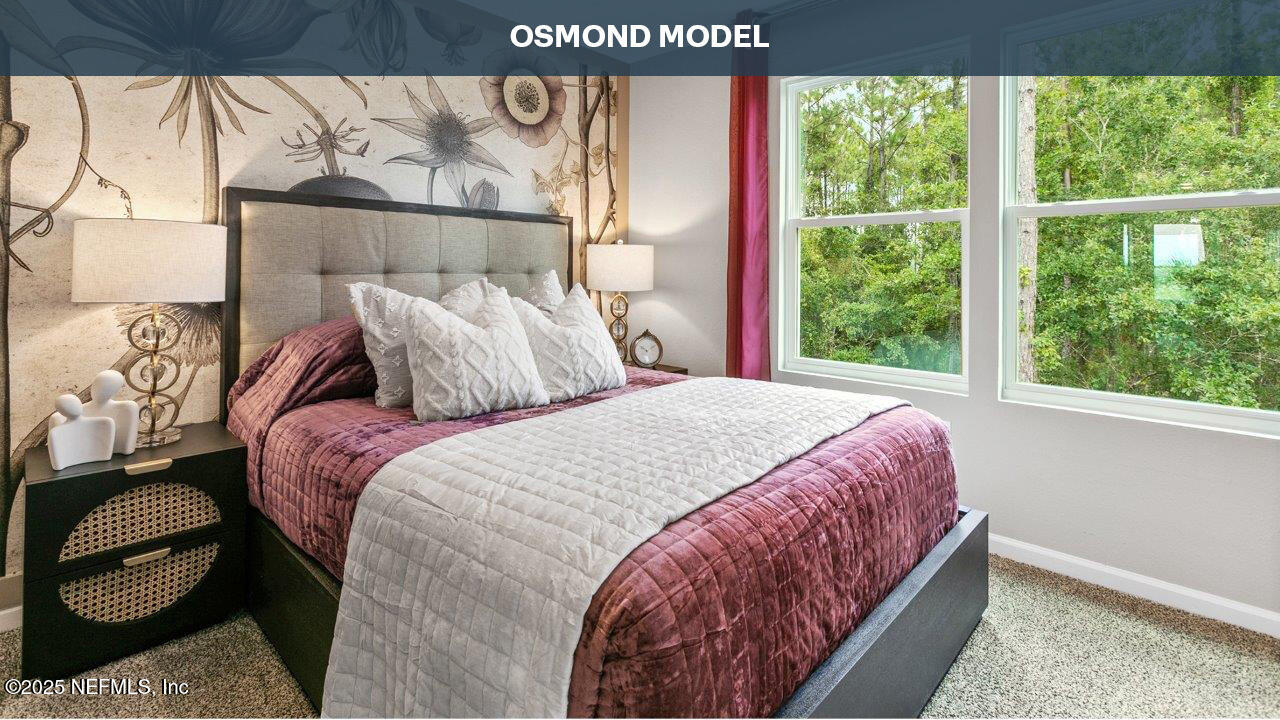 32 Montellano Road St. Augustine, FL 32084 - Photo 16 of 44 a bedroom with a bed and window