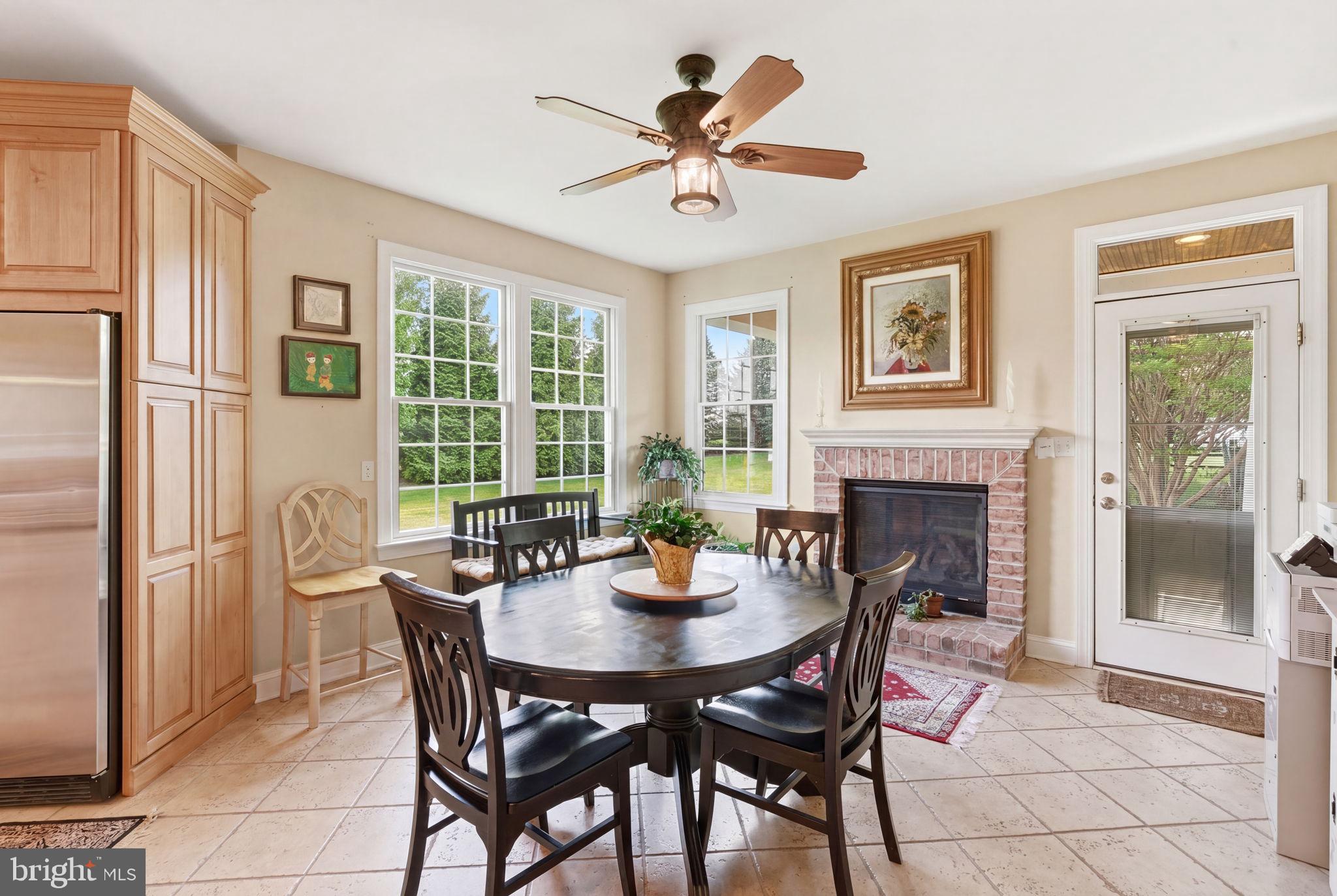 9 Deer Ridge Court Phoenix, MD 21131 - Photo 37 of 96 a view of a dining room with furniture window and outside view