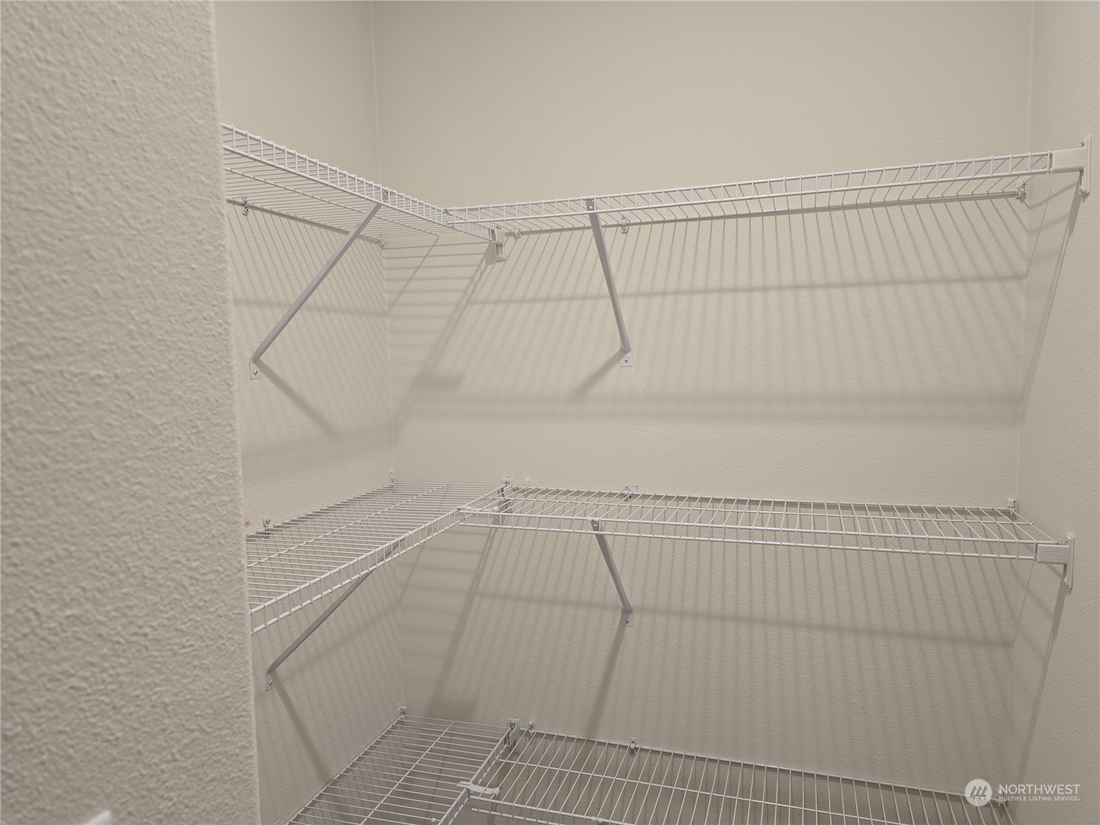 53 Newton Rd Forks Forks, WA 98331 - Photo 14 of 25 a view of a room with racks on the wall