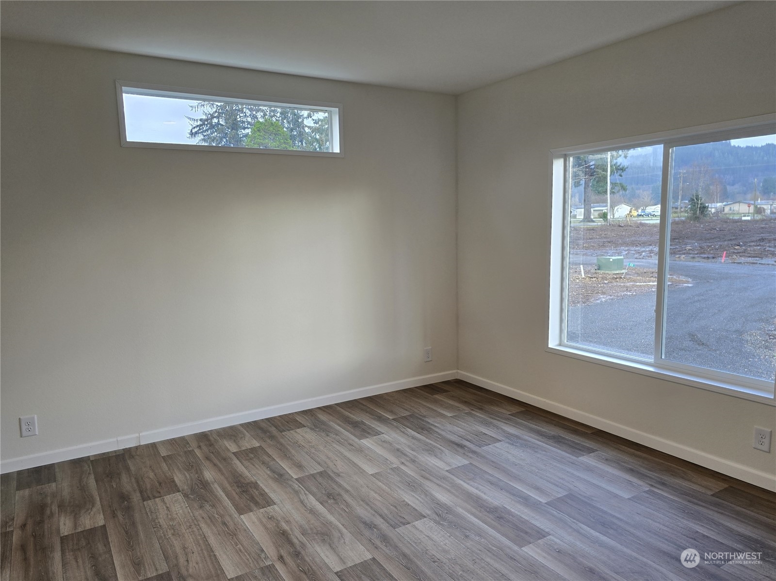 53 Newton Rd Forks Forks, WA 98331 - Photo 16 of 25 a view of an empty room with a window