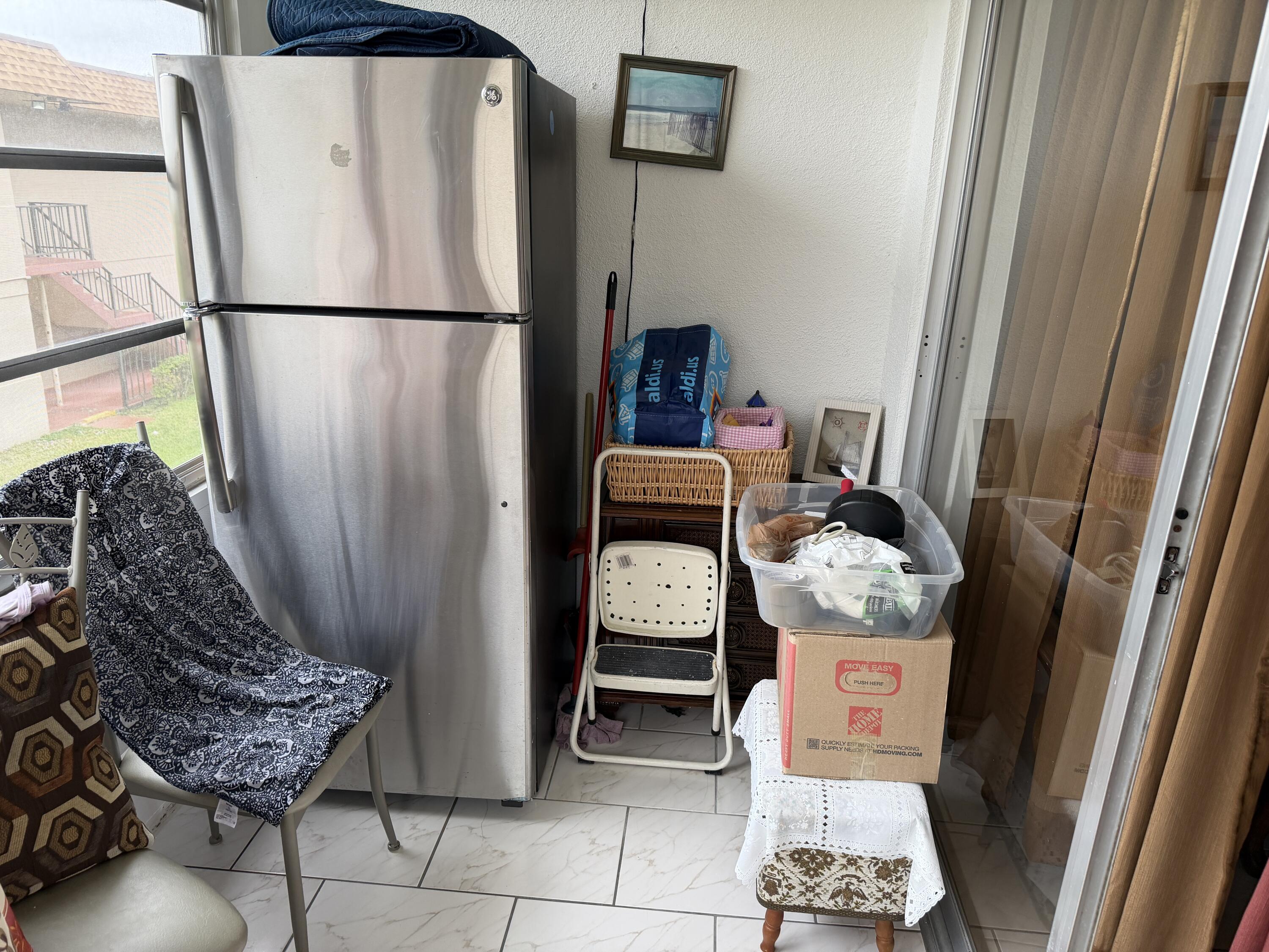 502 Davis Road, Unit 6 Palm Springs, FL 33461 - Photo 15 of 45 a refrigerator freezer sitting inside of a kitchen