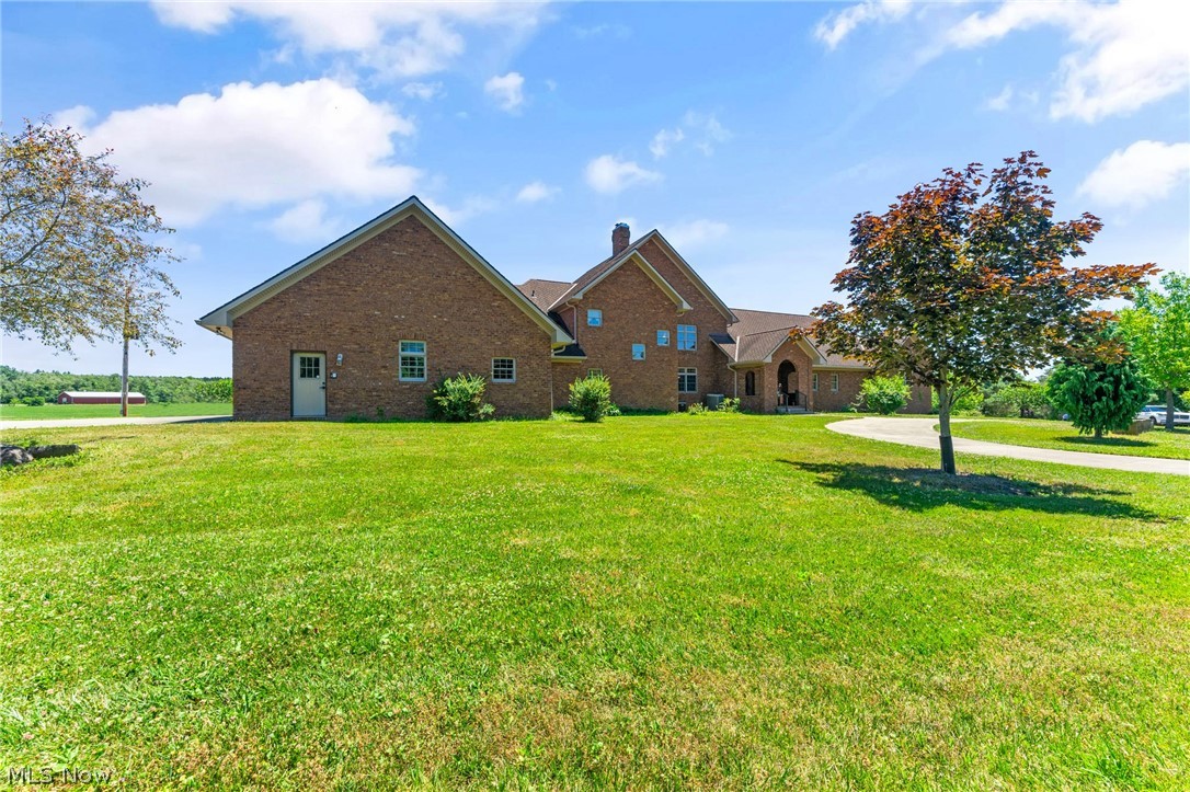 13721 Beaver Springfield Road New Springfield, OH 44443 - Photo 21 of 48 View of property exterior featuring a yard