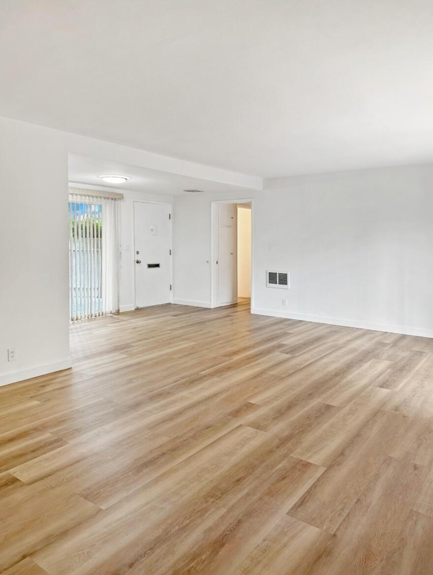 5740 Encina Road, Unit 3 Goleta, CA 93117 - Photo 10 of 25 a view of empty room with wooden floor