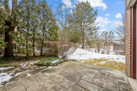 a view of snow on the side of a road