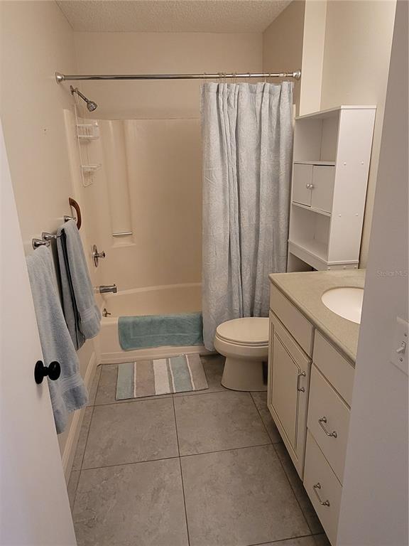 14447 Worthwhile Road Port Charlotte, FL 33953 - Photo 11 of 23 a bathroom with a granite countertop sink toilet and shower