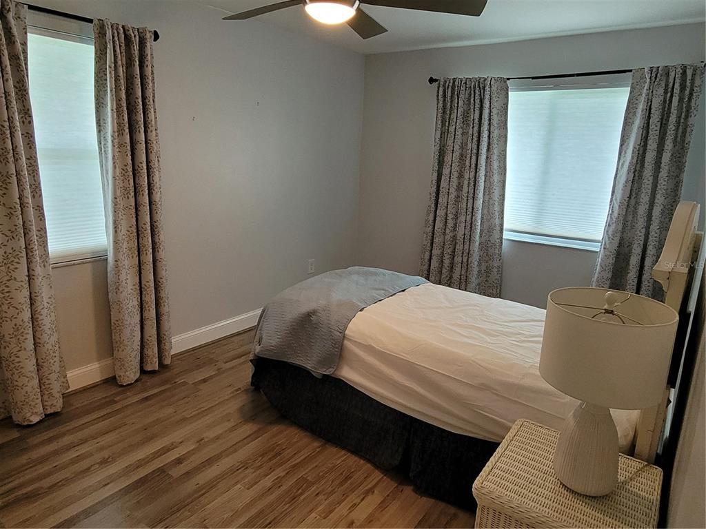 14447 Worthwhile Road Port Charlotte, FL 33953 - Photo 7 of 23 a bedroom with a bed and a mirror