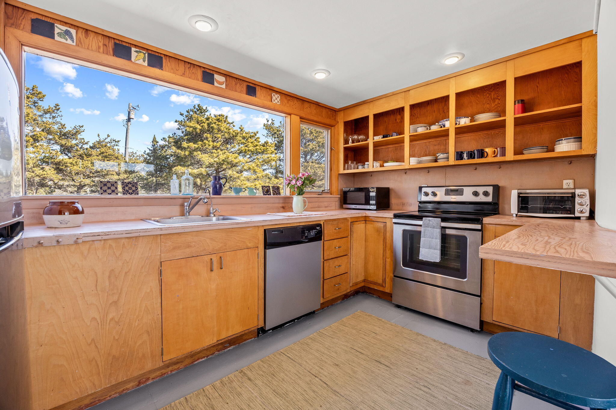 2 Cobb Road Truro, MA 02666 - Photo 11 of 38 a kitchen with stainless steel appliances granite countertop a stove and a sink